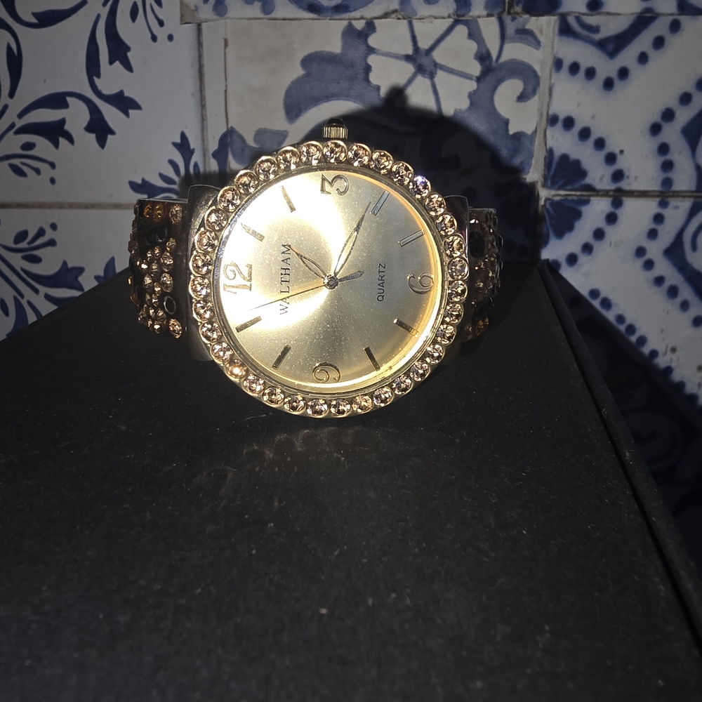 Elegant Gold Bracelet Watch with Crystal Details